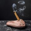 Горящая палочка Пало Санто в подставке для палочек пало санто